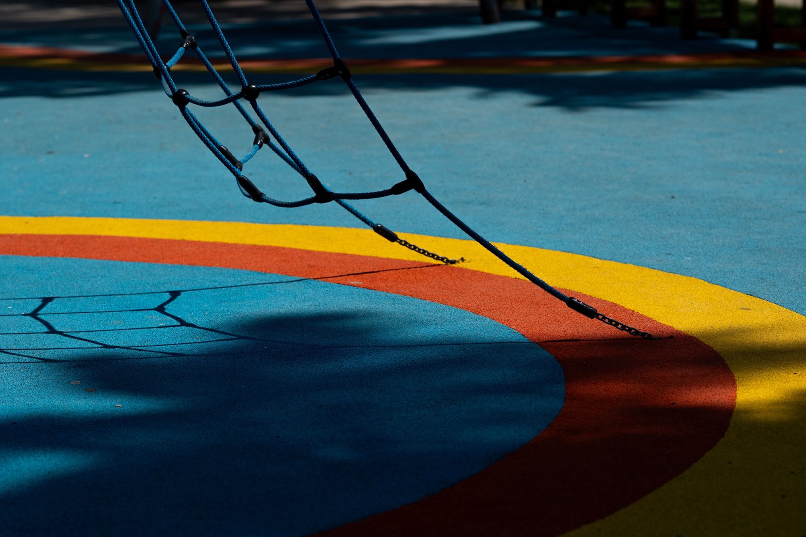 Colourful resin safety surfacing on a school playground